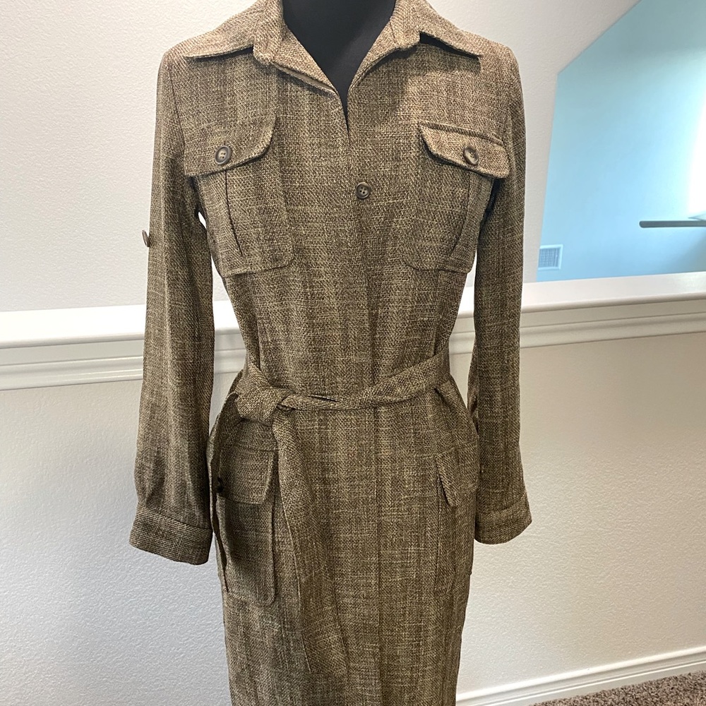 Lovely coatdress with fabric belt. Button front. Can be worn as 3/4 sleeve.